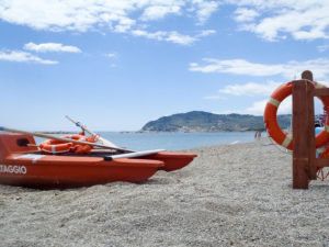 77292358 - san bartolomeo, italy - june 17, 2015: lifeboat bathers resting on the beach