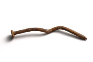 67530302 - crooked and rusty nail on a white background