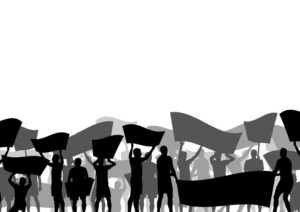 Protesters angry people crowd with posters and flags in abstract riot landscape background illustration