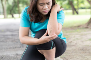 Sport injury. stumble and fall while running in the park